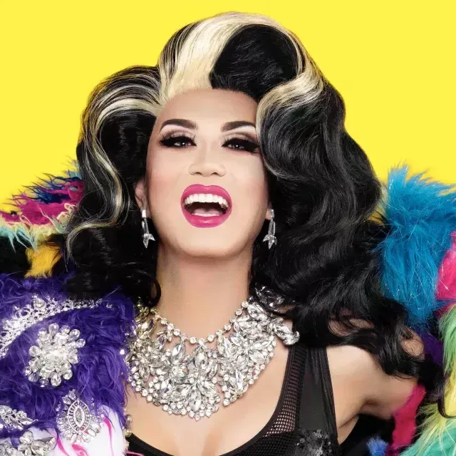 Drag Queen Manila Luzon with a yellow background